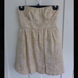 Strapless gold dress